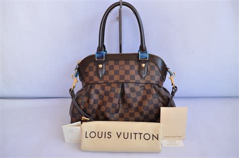 louis vuitton trevi pm fake vs real|false louis vuitton.